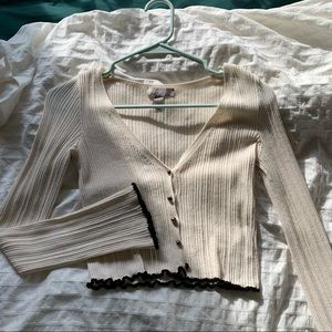 Cream ribbed cropped cardigan w black ruffle trim